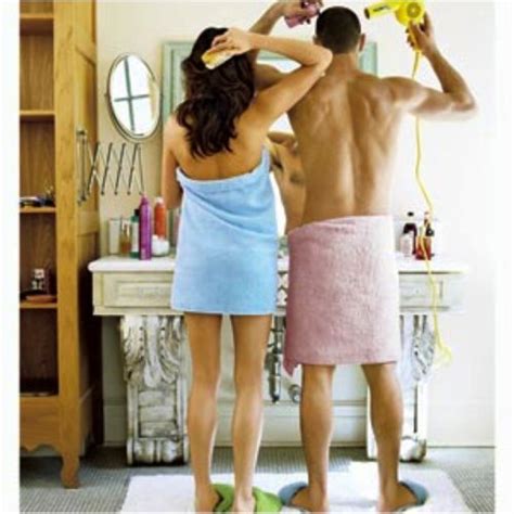 Cute Couple In Pink Towels Having Fun In Washroom After