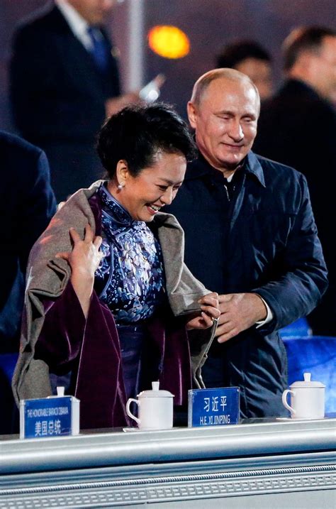 moment between putin and china s first lady business insider