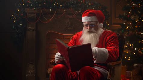 santa claus works  christmas eve reading stock footage sbv