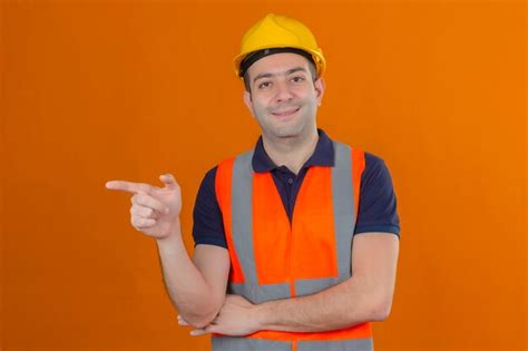 Free Photo Construction Worker Wearing Vest And Yellow Safety Helmet
