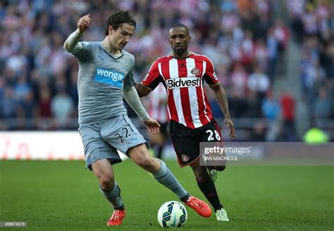 newcastle united s dutch defender daryl janmaat vies with