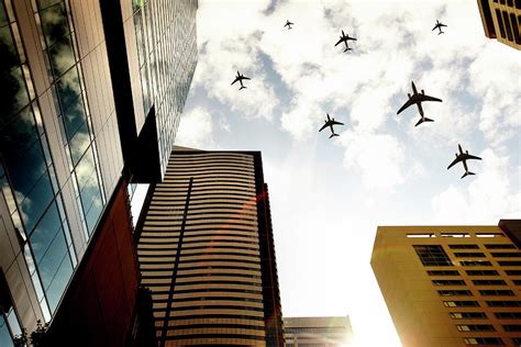 airplanes flying  buildings  thomas northcut