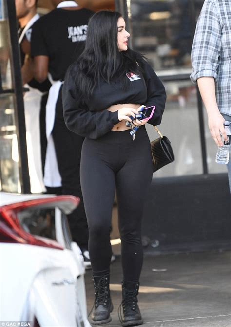 Ariel Winter Flashes Midriff In Crop Top And Leggings