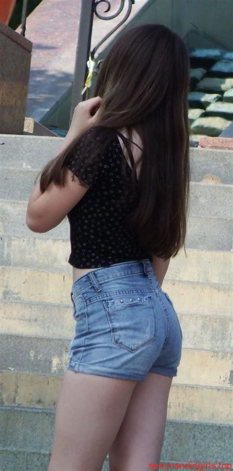 street candid girl with pale skin and hot ass in mini