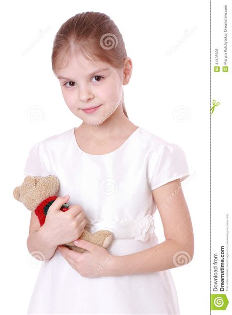 kid holding teddy bear stock photo image  happiness