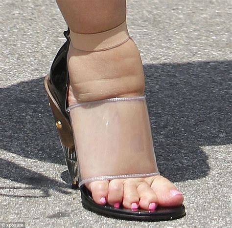 Kim Kardashian S Swollen Feet Are Severely Pinched As She Squeezes Them