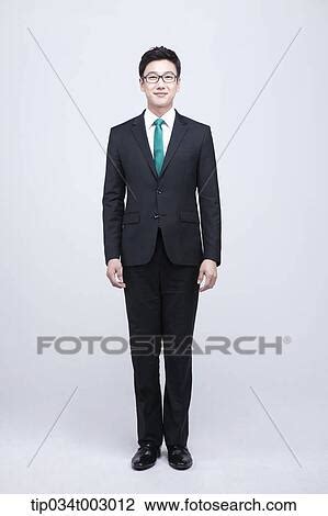man standing straight stock image tipt fotosearch