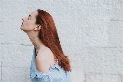 profile of a woman with beautiful long neck by stocksy contributor