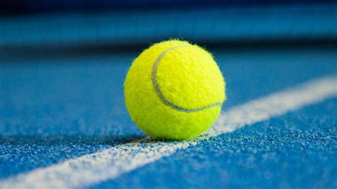 tennis balls yellow  green roger federer enters  debate