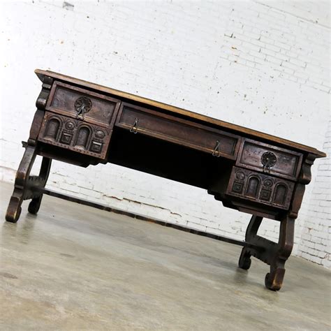 spanish revival style desk  hand wrought hardware  artes de