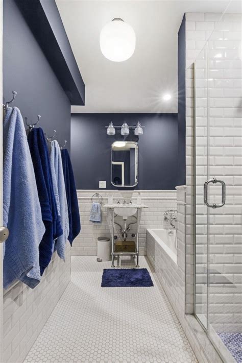 penny tile takes  bath  beige  blue beauty small apartment