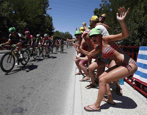 fans cheer the pack of riders 16th stage tour de france 2015