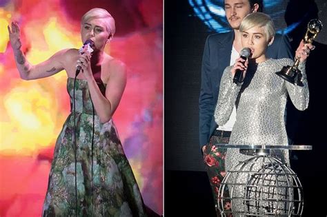 miley covers up in two demure gowns at world music awards mirror online
