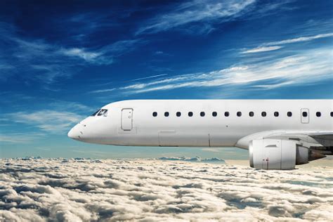 side view   commercial airplane flying stock photo  image