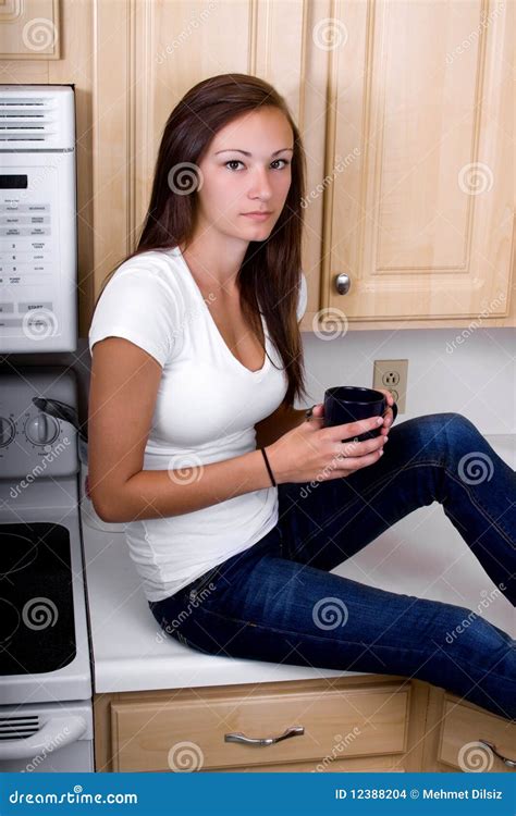 teenage girl in the kitchen stock images image 12388204