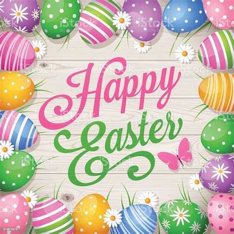 colorful easter eggs  wooden background  text happy easter stock