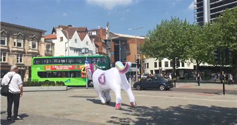 massive inflatable unicorn walking  bristol city centre bristol