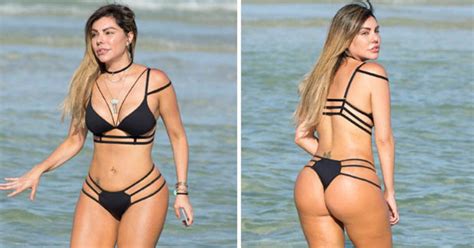 liziane gutierrez puts on a stringy display in revealing thong swimsuit