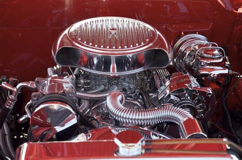 chrome engine  red car stock photo image  clean drive