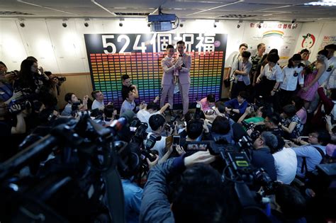 after a long fight taiwan s same sex couples celebrate new marriages