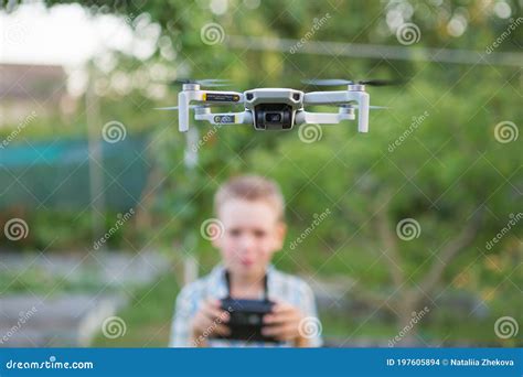 kid flying drone boy operate drones stock photo image  equipment model