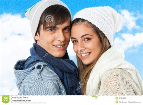 Portrait Of Cute Teen Couple In Winter Clothes Stock