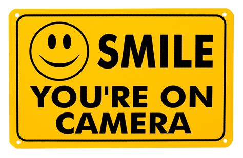 smile youre  camera signs    video taped