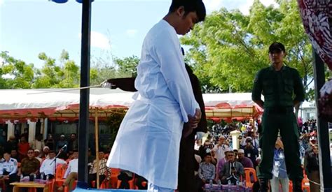 the randy report indonesia two men publicly flogged for