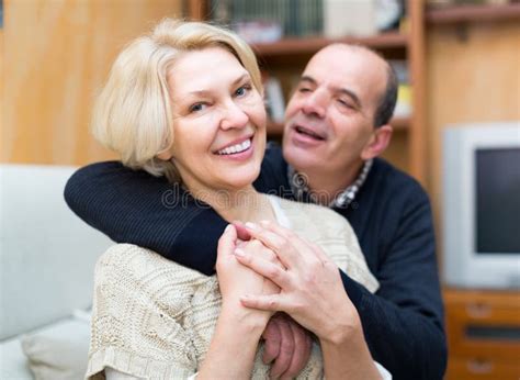 Mature Couple On Couch At Home Stock Image Image Of Joyful Flat