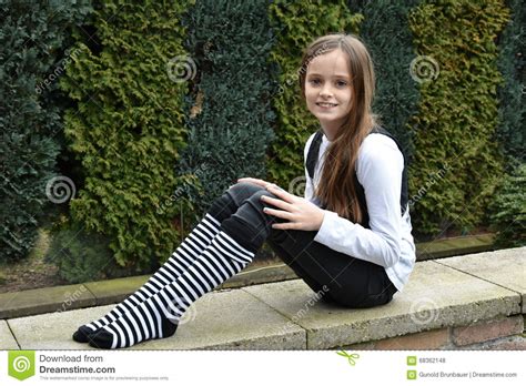 teeny in striped socks having some vibrator fun chubby