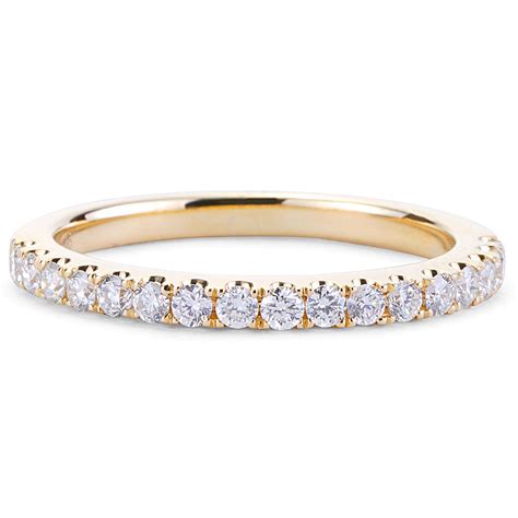 shared prong set diamond wedding band  yellow gold  york jewelers chicago