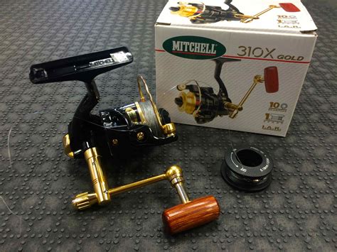 sold mitchell  gold spinning reel cw spare spool
