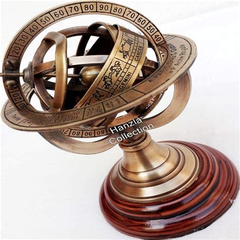 esfera armilar maritima astrolabio sobre base de  carulla