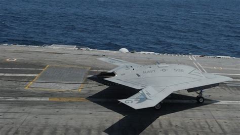 historic  navy lands unmanned drone  aircraft carrier fox news