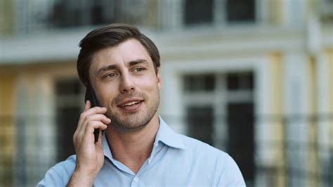 portrait handsome man having phone talk outdoor business man talking