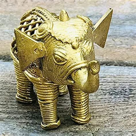 yellow brass home decor elephant statue  gift item  decoration  rs piece  raigarh