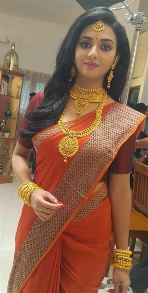 pin on red saree