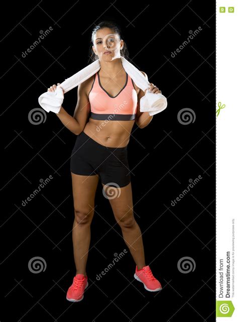 Latin Sport Woman Posing With Towel In Fierce And Badass Face