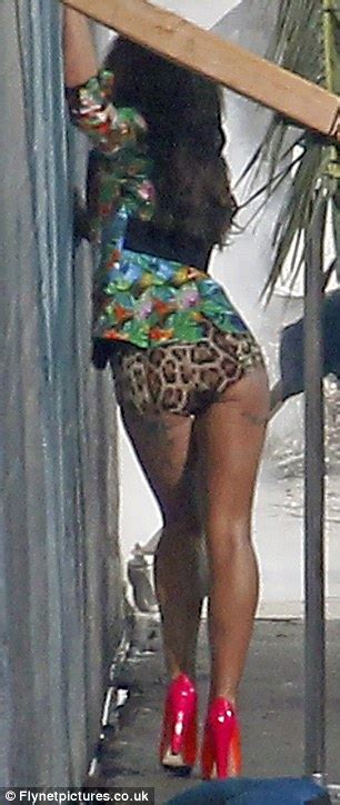 cheryl cole shows off her tanned and toned body as she films new music