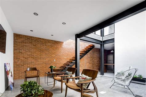 exposed brick walls steal  show   modern industrial home