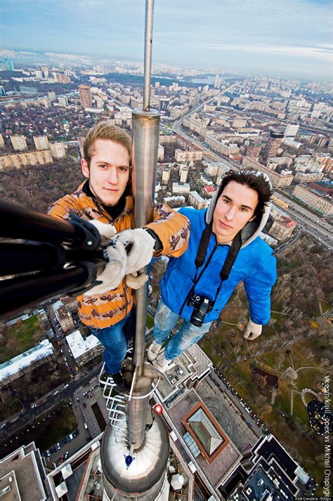 russian daredevil takes insane selfies dangling from the