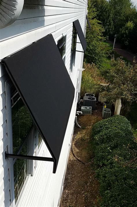 commercial awning welded frame window awning leola village black sunbrella house awnings