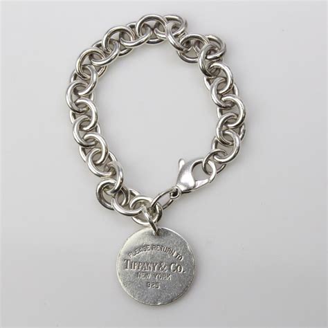 silver  return  tiffany  charm bracelet property room