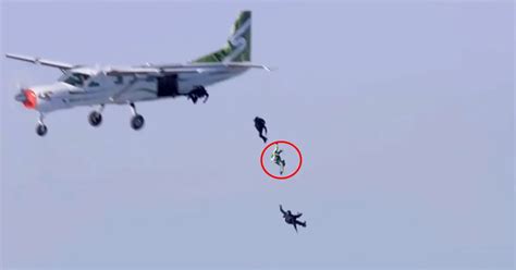 man jumps   feet  realizes    parachute