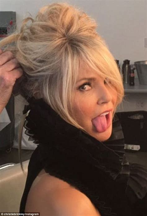 christie brinkley makes lewd facial expression during photo shoot with