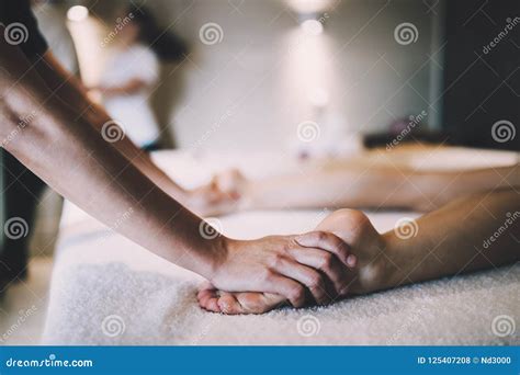 foot  sole massage  therapeutic relax treatment stock photo