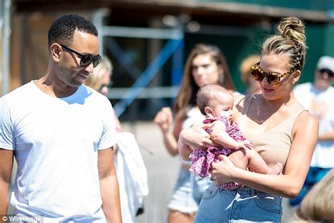 chrissy teigen and john legend show off luna to sports illustrated pals at fan event daily