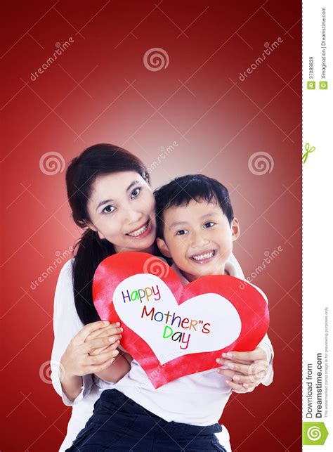 asian mother and son holding love card on red royalty free stock images image 37089839