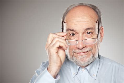 Portrait Of Old Man Taking Glasses Boozmanhof