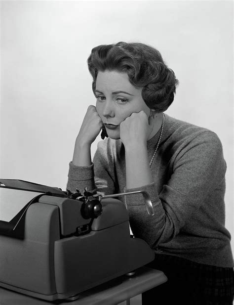 1950s 1960s Depressed Secretary Sitting Photograph By Vintage Images